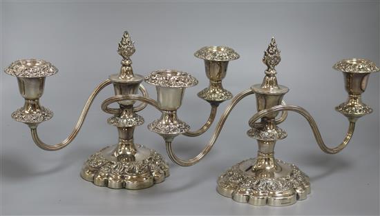 A pair of two branch silver plated candelabra